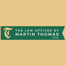 The Law Offices of Martin Thomas logo