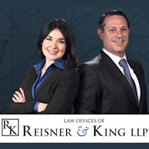 Law Offices of Reisner & King LLP logo