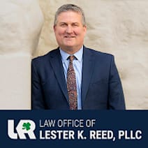 Law Office of Lester K. Reed, PLLC law firm logo