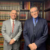 Hochberg, Costello & Baron law firm logo
