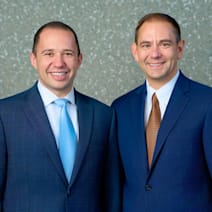 Brooks & Baez law firm logo